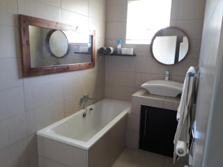 This spacious 4-bedroom, 2-bathroom home offers th...