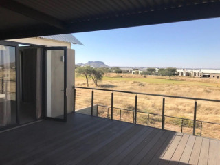 Modern 3-bedroom townhouse on 3 levels. The ground...