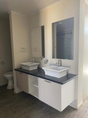 Modern 3-bedroom townhouse on 3 levels. The ground...