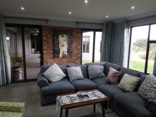 Enjoy modern estate living in this stylish 3-bedro...